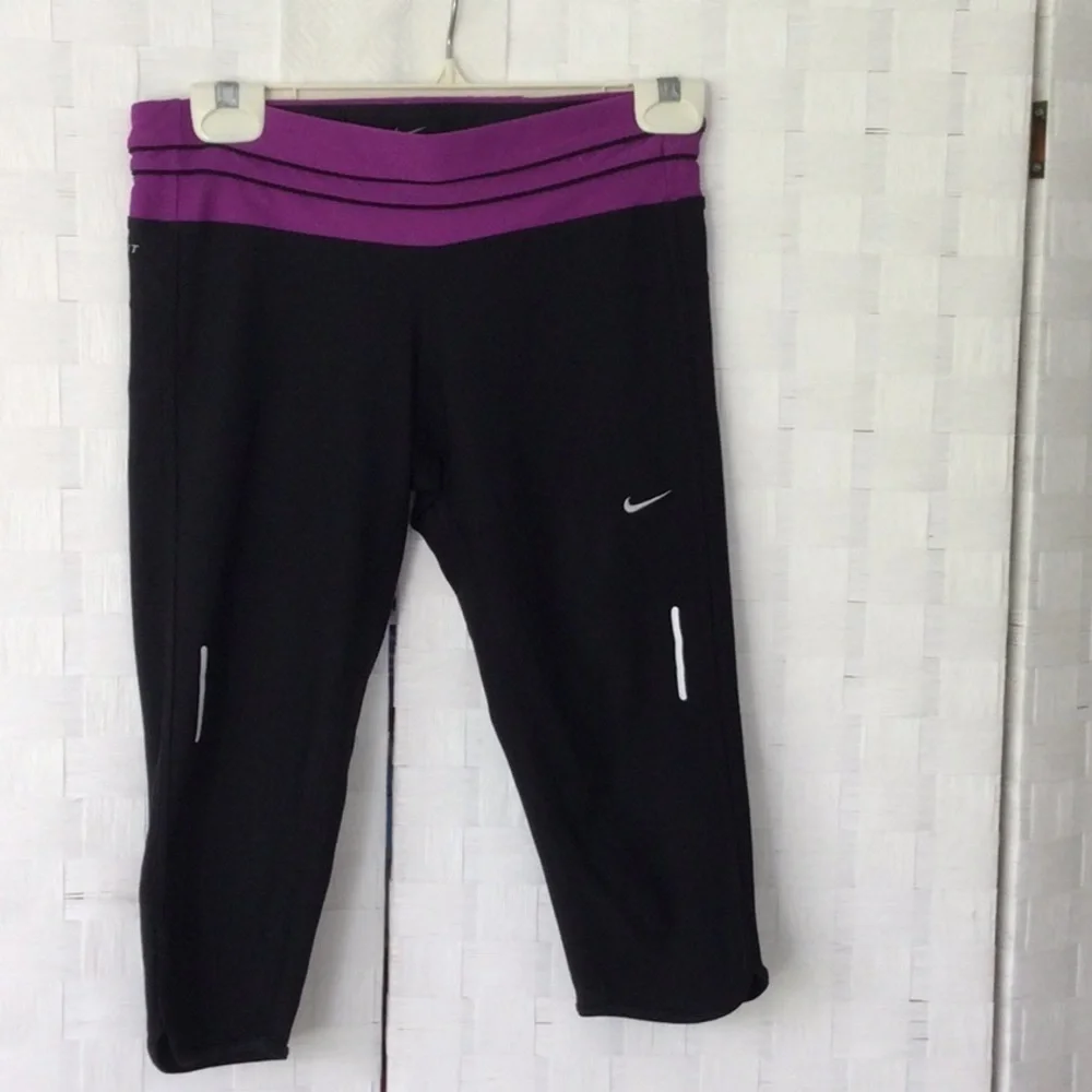 Woman’s Nike Running size M washable color black & purple. #432